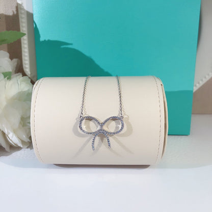 [Regalia Jewels]CLAW SET RHODIUM PLATED BOW NECKLACE