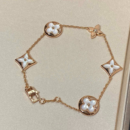 [Regalia Jewelry]STAR AND SUN 5 MOTIF MOP PINK GOLD BRACELET