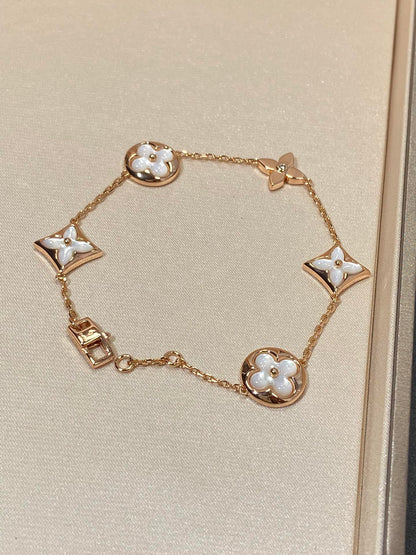 [Regalia Jewelry]STAR AND SUN 5 MOTIF MOP PINK GOLD BRACELET
