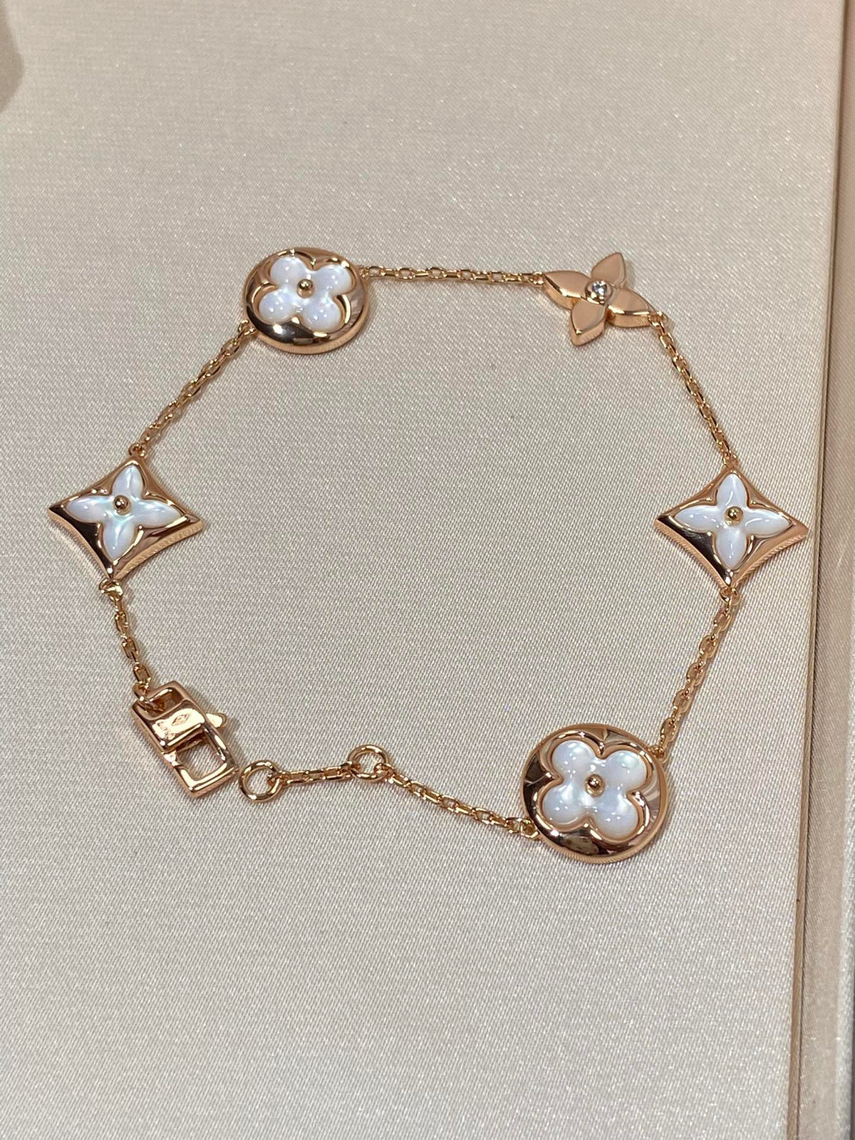 [Regalia Jewelry]STAR AND SUN 5 MOTIF MOP PINK GOLD BRACELET