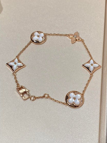 [Regalia Jewelry]STAR AND SUN 5 MOTIF MOP PINK GOLD BRACELET
