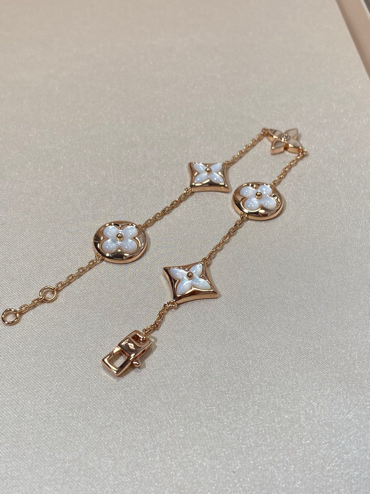 [Regalia Jewelry]STAR AND SUN 5 MOTIF MOP PINK GOLD BRACELET