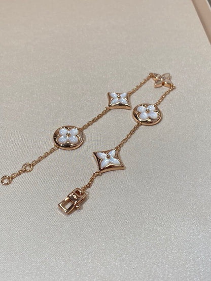 [Regalia Jewelry]STAR AND SUN 5 MOTIF MOP PINK GOLD BRACELET