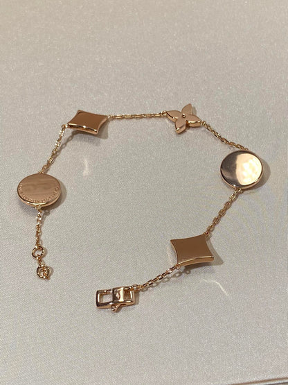 [Regalia Jewelry]STAR AND SUN 5 MOTIF MOP PINK GOLD BRACELET