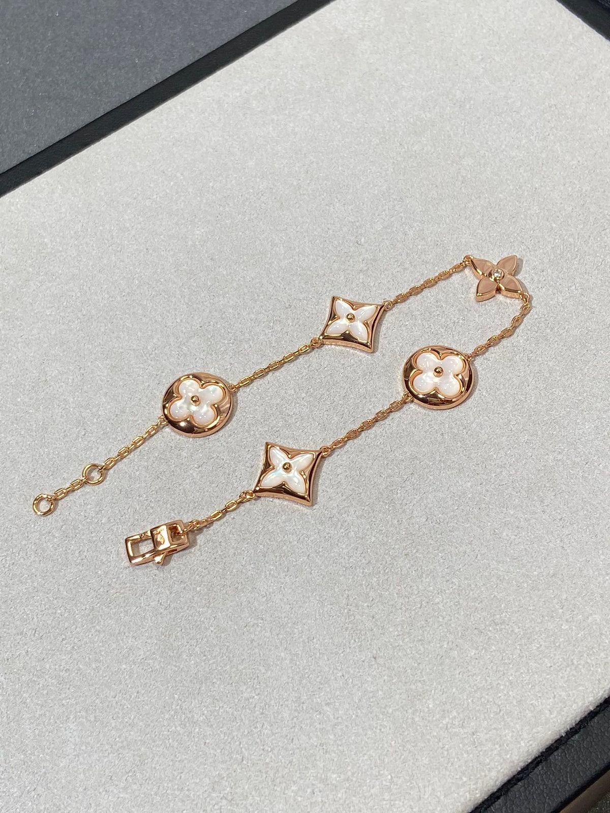 [Regalia Jewelry]STAR AND SUN 5 MOTIF MOP PINK GOLD BRACELET
