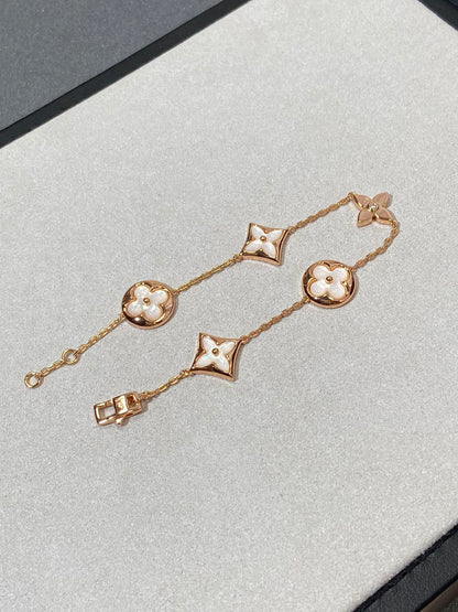 [Regalia Jewelry]STAR AND SUN 5 MOTIF MOP PINK GOLD BRACELET