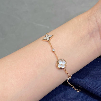 [Regalia Jewelry]STAR AND SUN 4 MOTIF WHITE MOP PINK GOLD BRACELET