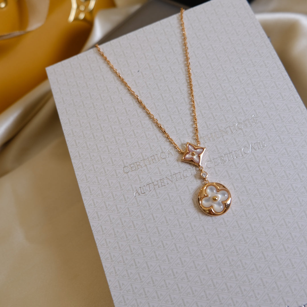 [Regalia Jewelry]STAR AND SUN WHITE MOP 2 MOTIF PINK GOLD NECKLACE