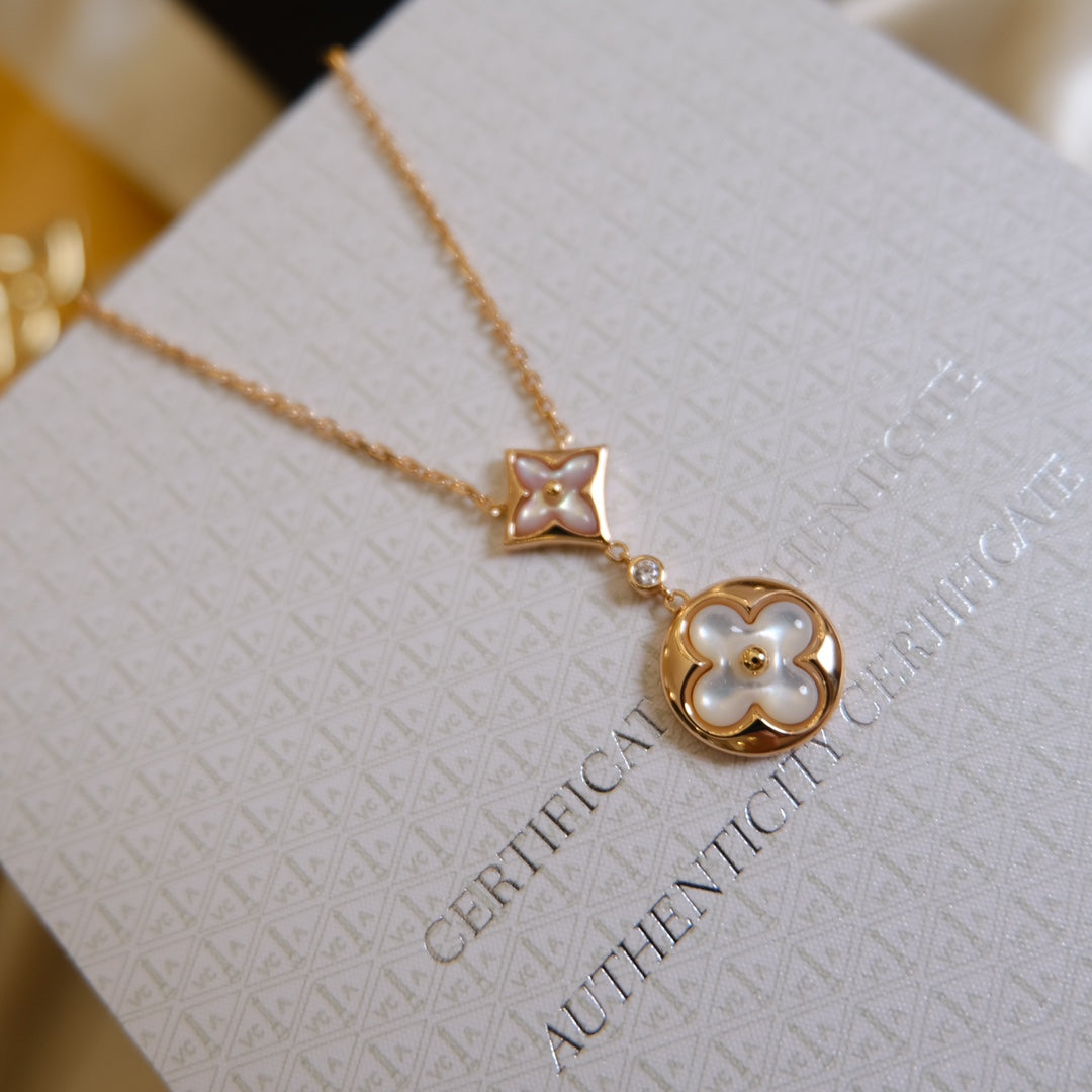 [Regalia Jewelry]STAR AND SUN WHITE MOP 2 MOTIF PINK GOLD NECKLACE