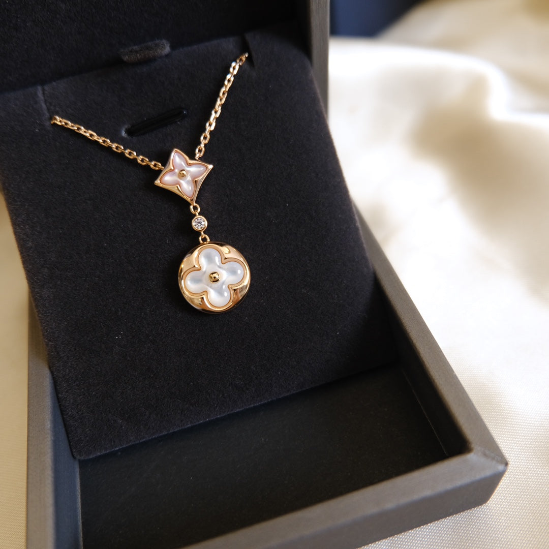 [Regalia Jewelry]STAR AND SUN WHITE MOP 2 MOTIF PINK GOLD NECKLACE