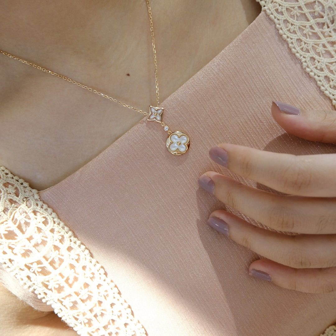 [Regalia Jewelry]STAR AND SUN WHITE MOP 2 MOTIF PINK GOLD NECKLACE