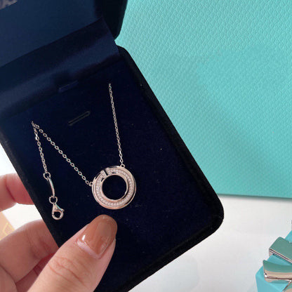 [Regalia Jewels]DIAMOND AND MOTHER OF PEARL CIRCLE PENDANT